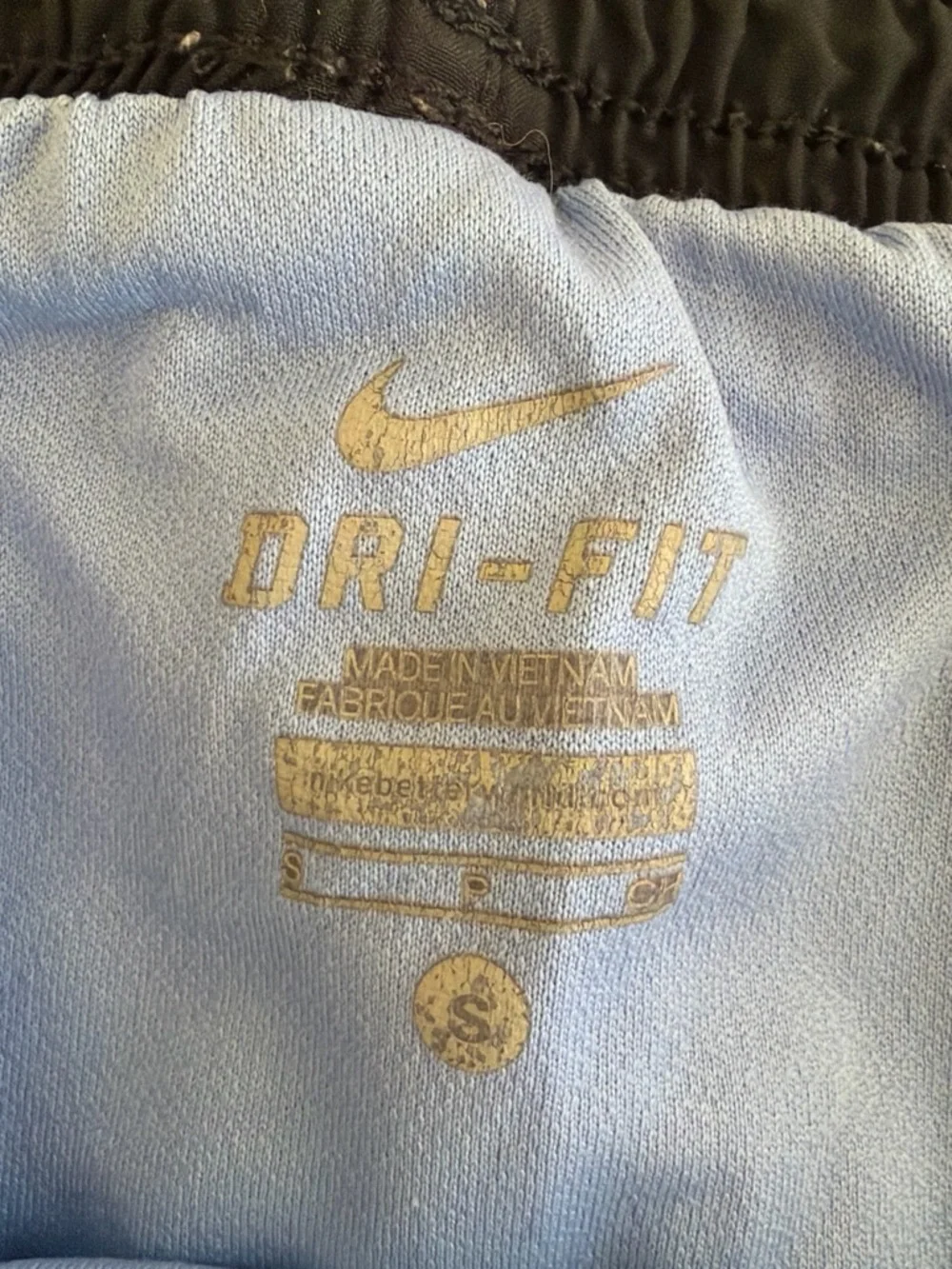 Nike Black Athletic Shorts with Light Blue Trim